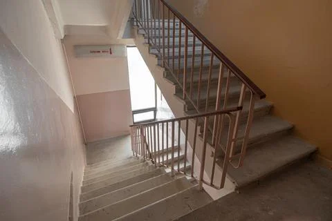 Interior of an empty staircase of an old Soviet house. Stock Photos