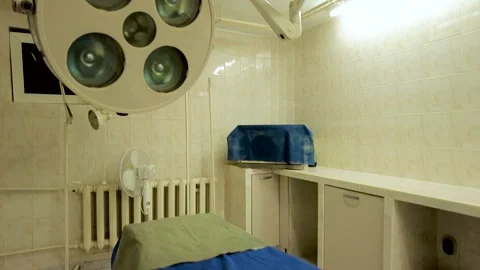 Interior of empty surgery room and medical equipment in old hospital. Stock Footage 263797298