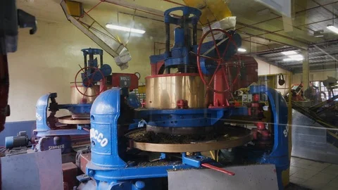 Interior of factory with machines processing tea production in Malaysia Stock Footage 146542714