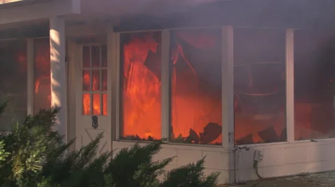 Interior fire seen from outside house Stock Footage 59241587