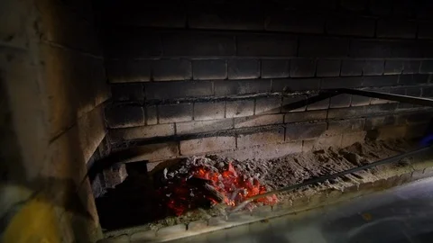 Interior Fireplace Close up shot. the fire iron moves coal Stock-Footage 104128861