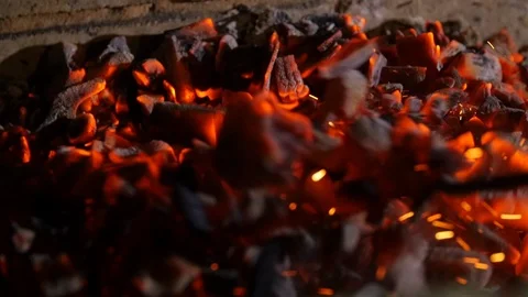 Interior Fireplace the fire iron moves coal. Macro Stock-Footage 104056910