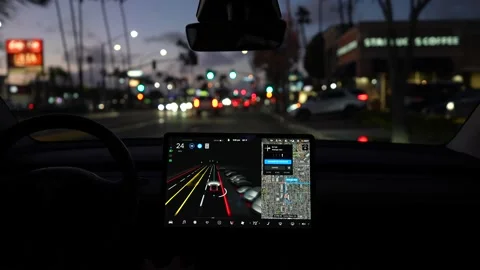 Interior of fully autonomous electric car EV in full self driving autopilot mode Stock Footage 166936058