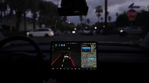 Interior of fully autonomous electric car EV in full self driving autopilot mode Stock Footage 166936447