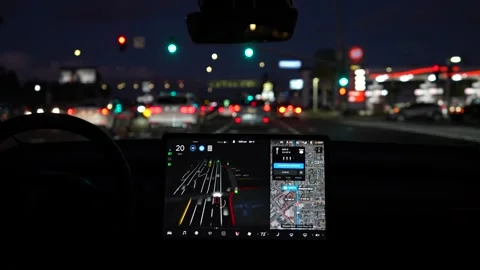 Interior of fully autonomous electric car EV in full self driving autopilot mode Stock Footage 166936648