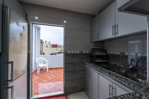 The interior of a fully equipped spacious modern kitchen Stock Photos