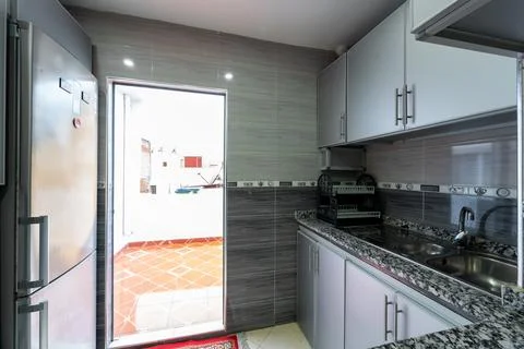 The interior of a fully equipped spacious modern kitchen Stock Photos