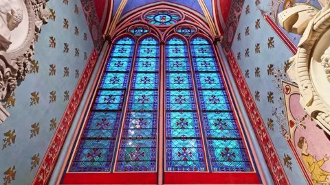 Interior of the Gothic cathedral of Notre Dame with its vibrant stained glass Stock Footage 307183969