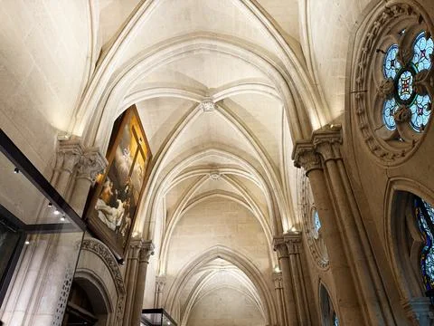 Interior of a Gothic Notre Dame cathedral with ribbed vaulted ceiling, stai.. Stock Photos