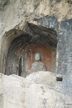 Interior of a Grotto with Buddhist Trinity Statues Stock Photos