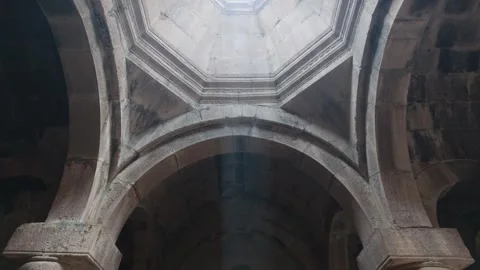 Interior of historic stone building with arched ceilings and central skylight Stock Footage 341735353