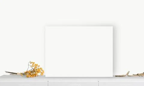 Interior horizontal rectangular poster mockup standing on the table with plan 스톡 사진
