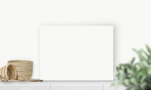 Interior horizontal rectangular poster mockup standing on the table with plan Stock Photos