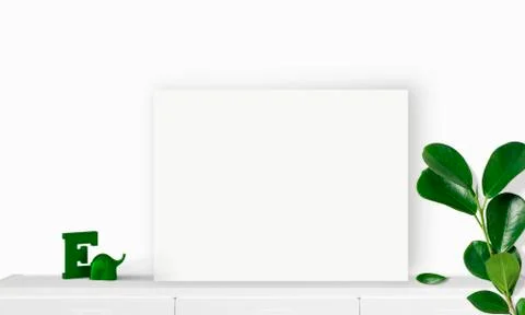 Interior horizontal rectangular poster mockup standing on the table with plan Stock Photos