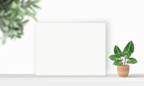 Interior horizontal rectangular poster mockup standing on the table with plan Stock Photos