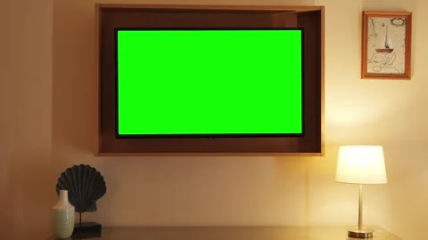 Interior of a hotel room. A green screen TV on the wall, chroma key. Stock Footage 330116973