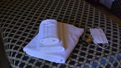 The interior of the hotel room for three, clean towels, room keys Stock Footage 132242103
