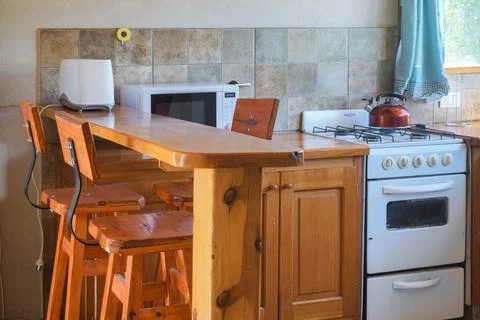 Interior of a house, kitchen and dining area Stock Photos