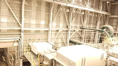 Interior of Industrial Facility with Metal Framework and Equipment Stock Photos