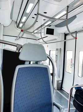 Interior inside in an empty carriage of the Barcelona train, seats, door for the Stock Photos