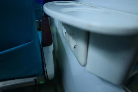 Interior inside an executive train. electric plugs. drinking stand. Stock Photos