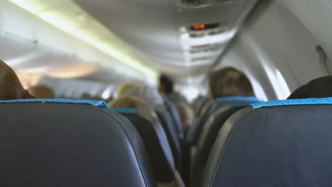 Interior inside of the plane with passengers. Stock Footage 92530982