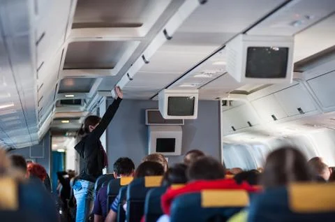 Interior inside of the plane with passengers. Foto stock