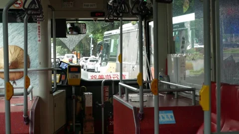 Interior inside the public transportation bus while in the major city of Ta.. Stock Footage 302386329
