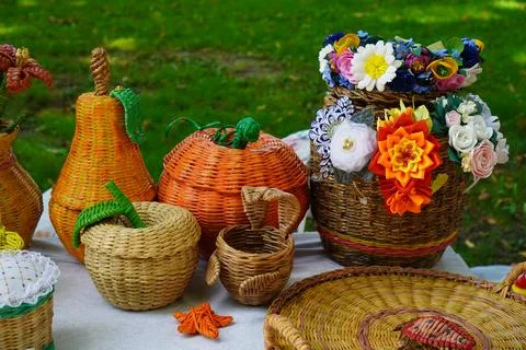 Interior items in the form of bread boxes like pumpkins, baskets with flowers 写真素材