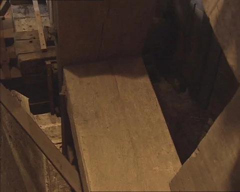 Interior Kinderdijk windmill - cogwheel wind shaft slowly turning - close up Stock Footage 112987463