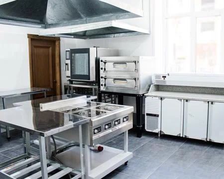Interior kitchen in a cafe or restaurant, professional kitchen equipment Stock Photos