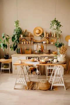 Interior of kitchen is made of wood with elements of eco style. autumn decor. Stock Photos