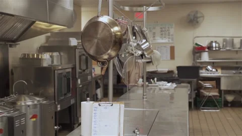 Interior of the kitchen of the restaurant / canteen in the school with dishes . Stock Footage 135320831