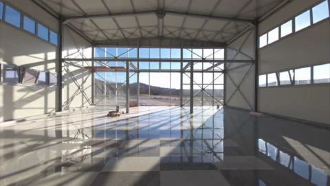 Interior of large commercial building - empty warehouse or industrial hall. Stock Footage 231349362