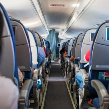 Interior of large passengers airplane Stock Photos