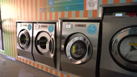 Interior Of Large Self Service Laundry Shop Stock Footage 205742907
