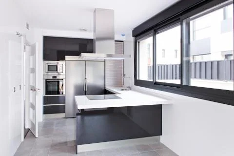 Interior of light modern kitchen Stock Photos