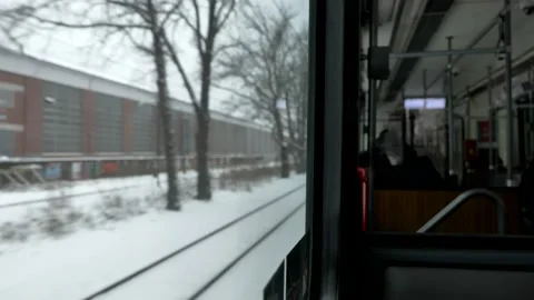Interior light rail tram's and snow through window. Stock Footage 148125868