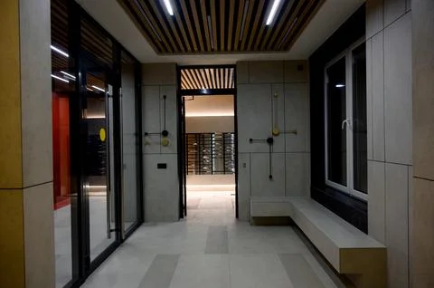 Interior of the lobby with metal elevators Stock Photos