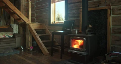 Interior log cabin with fireplace stove Stock Video Pond5