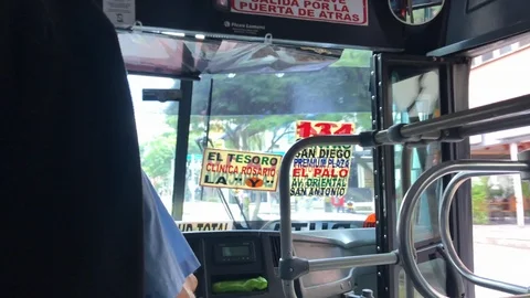 Interior looking forward in city bus driving on street Stock-Footage 98565822
