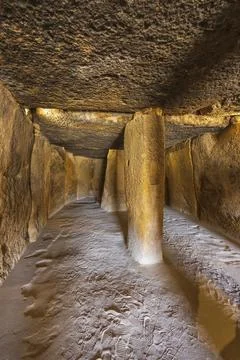 Interior of the Menga dolmen, view of the central pillar, UNESCO site, Ante.. Stock Photos