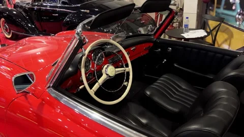 The interior of a Mercedes 190 SL at the Sofia Motor Show 2024. It's a vintage Stock Footage 293262532