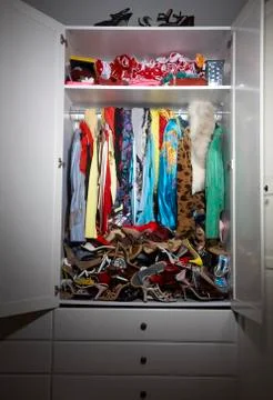 Interior of Messy Closet 库存照片