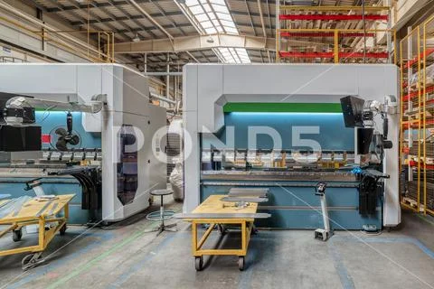 The interior of the metalworking shop. Modern industrial enterprise. Stock Photos
