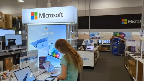 Interior of Microsoft Store With Customers. Customers Browsing, Trying and .. Video stock 336663254