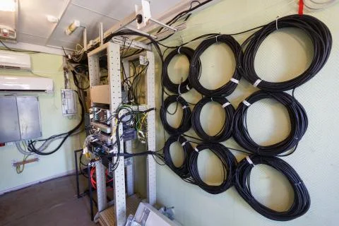 Interior of modern basic station of communications equipment and bights of optic Stock Photos