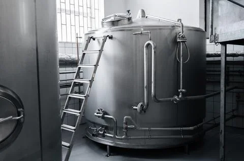 Interior of modern brewery with beer fermentation tanks Stock Photos