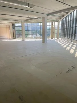 Interior of a modern building, view from inside the room, construction site Stock Photos
