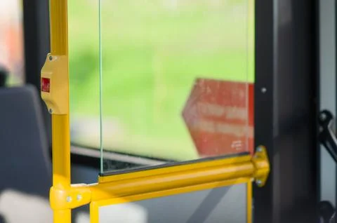 Interior of modern bus. stop alert button on handle Photos